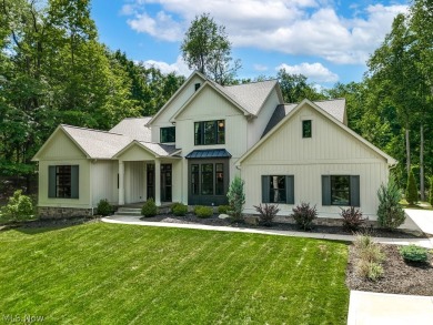 Nestled on over 1.5 wooded acres in Orange School District, this on The Country Club in Ohio - for sale on GolfHomes.com, golf home, golf lot