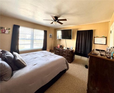 Welcome home to this inviting two-bedroom, two-bath property on Redwood Falls Golf Club in Minnesota - for sale on GolfHomes.com, golf home, golf lot