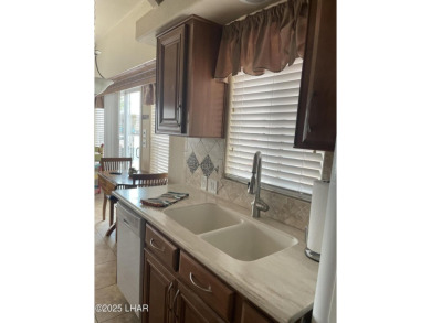 Beautiful & easy to care for stuccoed Park Model w/tile roof in on The Refuge Golf and Country Club in Arizona - for sale on GolfHomes.com, golf home, golf lot
