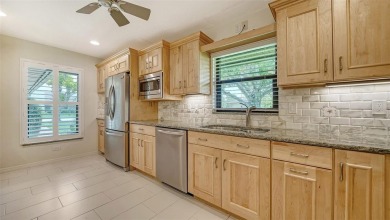 Discover comfort and tranquility in this beautifully updated on TPC Prestancia in Florida - for sale on GolfHomes.com, golf home, golf lot