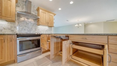 Discover comfort and tranquility in this beautifully updated on TPC Prestancia in Florida - for sale on GolfHomes.com, golf home, golf lot