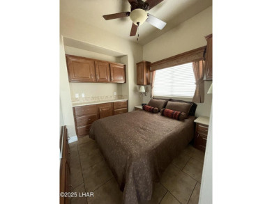 Beautiful & easy to care for stuccoed Park Model w/tile roof in on The Refuge Golf and Country Club in Arizona - for sale on GolfHomes.com, golf home, golf lot