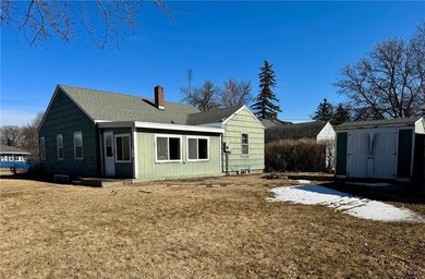 Welcome home to this inviting two-bedroom, two-bath property on Redwood Falls Golf Club in Minnesota - for sale on GolfHomes.com, golf home, golf lot