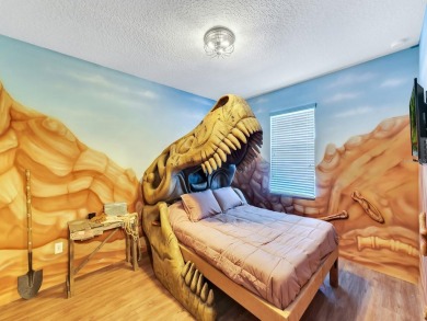 Here's your chance to own the World Famous Raptor Retreat!  This on The Oasis Club at Champions Gate in Florida - for sale on GolfHomes.com, golf home, golf lot