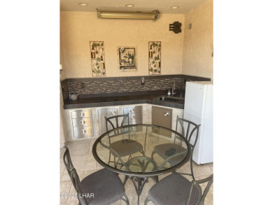 Beautiful & easy to care for stuccoed Park Model w/tile roof in on The Refuge Golf and Country Club in Arizona - for sale on GolfHomes.com, golf home, golf lot