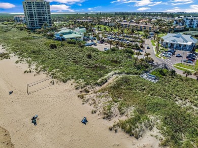 WANT TO LIVE WITHIN STEPS OF THE BEACH? Welcome to a rare on Ocean Village Golf Course in Florida - for sale on GolfHomes.com, golf home, golf lot