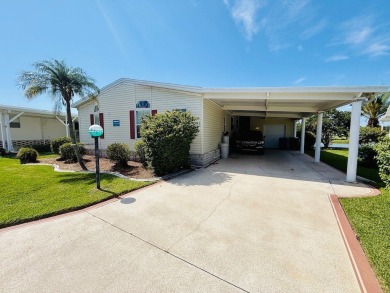 EXQUISTE LAKEFRONT HOME IN A GATED COMMUNITY OFFERING on Cypress Greens in Florida - for sale on GolfHomes.com, golf home, golf lot