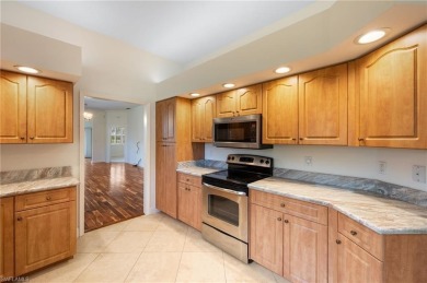 Discover Southwest Florida living in this 2-bedroom plus den on Cypress Lake Country Club in Florida - for sale on GolfHomes.com, golf home, golf lot