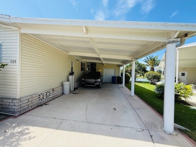 EXQUISTE LAKEFRONT HOME IN A GATED COMMUNITY OFFERING on Cypress Greens in Florida - for sale on GolfHomes.com, golf home, golf lot