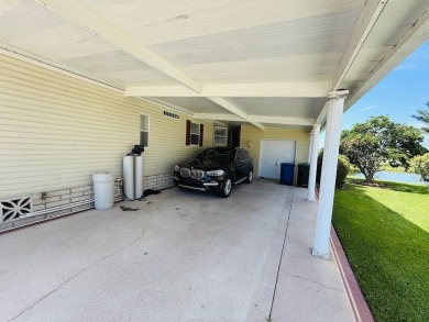 EXQUISTE LAKEFRONT HOME IN A GATED COMMUNITY OFFERING on Cypress Greens in Florida - for sale on GolfHomes.com, golf home, golf lot