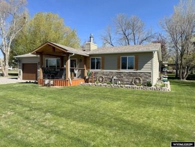 Welcome to this extensively renovated one-level 3-bedroom on Riverton Country Club in Wyoming - for sale on GolfHomes.com, golf home, golf lot
