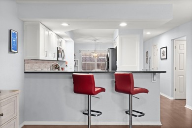 Fully furnished, ground-level luxury condo in the highly on Pointe Royale Village Country Club in Missouri - for sale on GolfHomes.com, golf home, golf lot