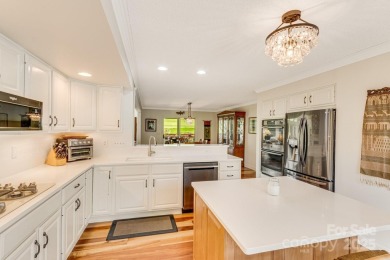 Elegance meets breathtaking golf course views in this on Kenmure Country Club in North Carolina - for sale on GolfHomes.com, golf home, golf lot