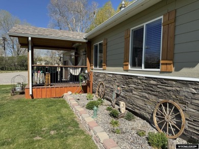 Welcome to this extensively renovated one-level 3-bedroom on Riverton Country Club in Wyoming - for sale on GolfHomes.com, golf home, golf lot