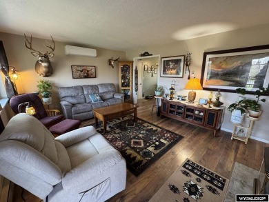 Welcome to this extensively renovated one-level 3-bedroom on Riverton Country Club in Wyoming - for sale on GolfHomes.com, golf home, golf lot