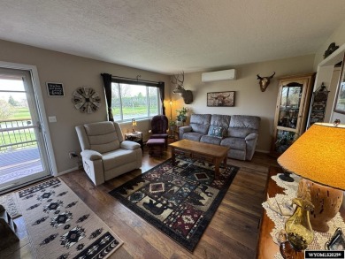 Welcome to this extensively renovated one-level 3-bedroom on Riverton Country Club in Wyoming - for sale on GolfHomes.com, golf home, golf lot