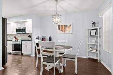 Fully furnished, ground-level luxury condo in the highly on Pointe Royale Village Country Club in Missouri - for sale on GolfHomes.com, golf home, golf lot