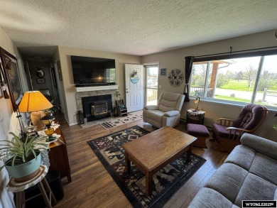 Welcome to this extensively renovated one-level 3-bedroom on Riverton Country Club in Wyoming - for sale on GolfHomes.com, golf home, golf lot