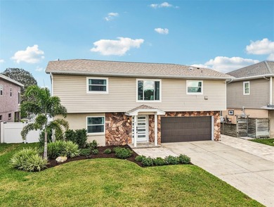 Welcome to 95 Eastwinds Court, an incredible WATERFRONT RETREAT on Innisbrook Resort and Golf Club in Florida - for sale on GolfHomes.com, golf home, golf lot