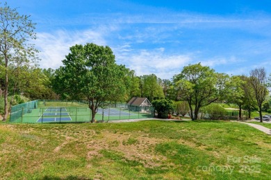 Elegance meets breathtaking golf course views in this on Kenmure Country Club in North Carolina - for sale on GolfHomes.com, golf home, golf lot