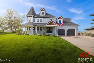 Experience refined elegance in this over 5,000 sq ft on Bell Nob Golf Course in Wyoming - for sale on GolfHomes.com, golf home, golf lot