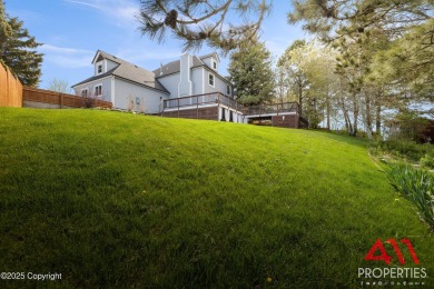 Experience refined elegance in this over 5,000 sq ft on Bell Nob Golf Course in Wyoming - for sale on GolfHomes.com, golf home, golf lot