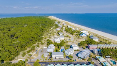 Experience the best of island living in this beautiful, fully on Isle Dauphine Club Golf Course in Alabama - for sale on GolfHomes.com, golf home, golf lot