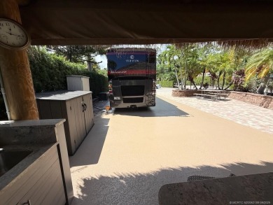 This stunning lot offers the perfect combination of beauty on Motorcoach Resort Golf Course in Florida - for sale on GolfHomes.com, golf home, golf lot