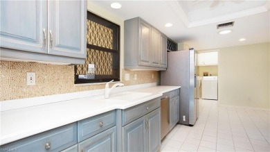 Enjoy the best of Naples living in this charming villa, ideally on The Glades Golf and Country Club in Florida - for sale on GolfHomes.com, golf home, golf lot