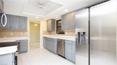 Enjoy the best of Naples living in this charming villa, ideally on The Glades Golf and Country Club in Florida - for sale on GolfHomes.com, golf home, golf lot