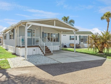 A beautifully updated 2-bedroom, 1-bathroom manufactured home in on Polo Park East in Florida - for sale on GolfHomes.com, golf home, golf lot