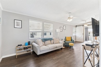 A beautifully updated 2-bedroom, 1-bathroom manufactured home in on Polo Park East in Florida - for sale on GolfHomes.com, golf home, golf lot