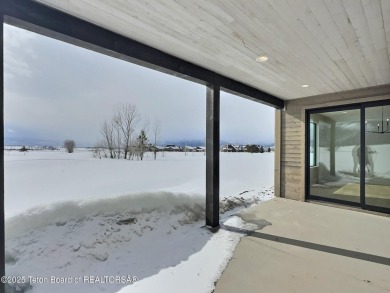 This stunning property features 4 bdrms, 4.5 bathrooms, and an on Teton Reserve in Idaho - for sale on GolfHomes.com, golf home, golf lot