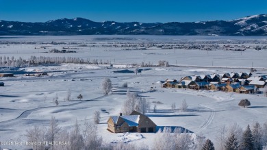 This stunning property features 4 bdrms, 4.5 bathrooms, and an on Teton Reserve in Idaho - for sale on GolfHomes.com, golf home, golf lot