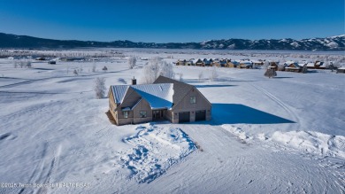 This stunning property features 4 bdrms, 4.5 bathrooms, and an on Teton Reserve in Idaho - for sale on GolfHomes.com, golf home, golf lot