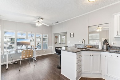 A beautifully updated 2-bedroom, 1-bathroom manufactured home in on Polo Park East in Florida - for sale on GolfHomes.com, golf home, golf lot
