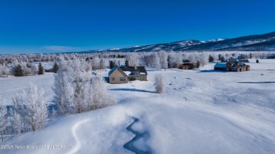 This stunning property features 4 bdrms, 4.5 bathrooms, and an on Teton Reserve in Idaho - for sale on GolfHomes.com, golf home, golf lot