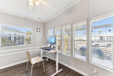 A beautifully updated 2-bedroom, 1-bathroom manufactured home in on Polo Park East in Florida - for sale on GolfHomes.com, golf home, golf lot