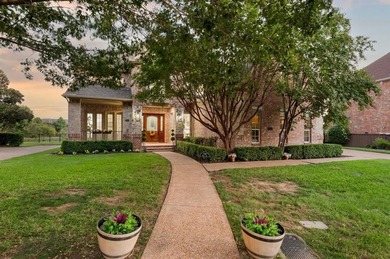 Welcome to this exquisite property! Nestled inside the on Hackberry Creek Country Club in Texas - for sale on GolfHomes.com, golf home, golf lot