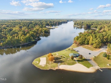 Welcome to 101 Cochise Cove, a 3-bedroom, 3.5-bath home with 3 on River Golf and County Club at Lake Royale in North Carolina - for sale on GolfHomes.com, golf home, golf lot