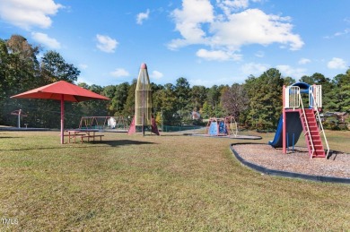 Welcome to 101 Cochise Cove, a 3-bedroom, 3.5-bath home with 3 on River Golf and County Club at Lake Royale in North Carolina - for sale on GolfHomes.com, golf home, golf lot