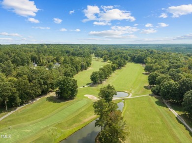 Welcome to 101 Cochise Cove, a 3-bedroom, 3.5-bath home with 3 on River Golf and County Club at Lake Royale in North Carolina - for sale on GolfHomes.com, golf home, golf lot
