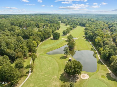 Welcome to 101 Cochise Cove, a 3-bedroom, 3.5-bath home with 3 on River Golf and County Club at Lake Royale in North Carolina - for sale on GolfHomes.com, golf home, golf lot