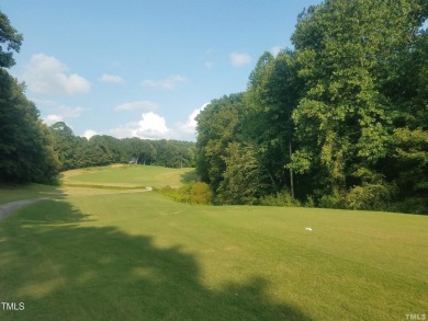 Welcome to 101 Cochise Cove, a 3-bedroom, 3.5-bath home with 3 on River Golf and County Club at Lake Royale in North Carolina - for sale on GolfHomes.com, golf home, golf lot