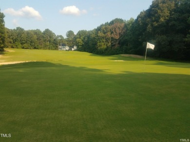 Welcome to 101 Cochise Cove, a 3-bedroom, 3.5-bath home with 3 on River Golf and County Club at Lake Royale in North Carolina - for sale on GolfHomes.com, golf home, golf lot