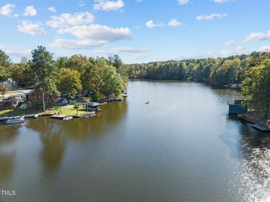 This is a thoughtfully designed home with 3-bedroom, 3.5-bath on River Golf and County Club at Lake Royale in North Carolina - for sale on GolfHomes.com, golf home, golf lot