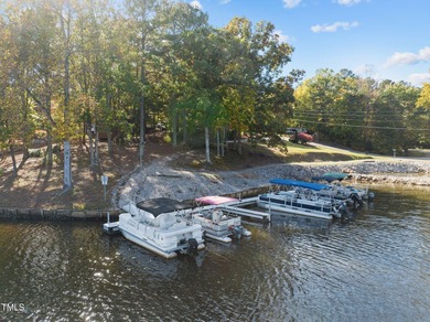 This is a thoughtfully designed home with 3-bedroom, 3.5-bath on River Golf and County Club at Lake Royale in North Carolina - for sale on GolfHomes.com, golf home, golf lot