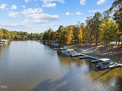 This is a thoughtfully designed home with 3-bedroom, 3.5-bath on River Golf and County Club at Lake Royale in North Carolina - for sale on GolfHomes.com, golf home, golf lot