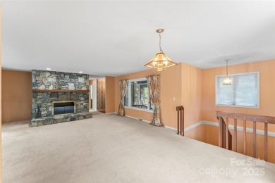 LAKEFRONT LIVING AS IT'S FINEST! Nestled in serene natural on Connestee Falls Golf Club in North Carolina - for sale on GolfHomes.com, golf home, golf lot