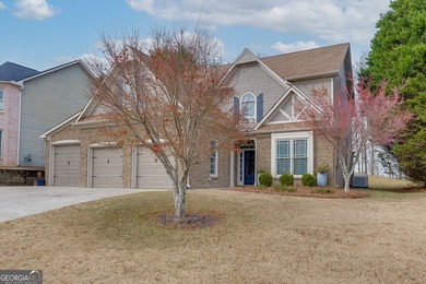 Welcome to this spacious and well-maintained 5-bedroom, 3-bath on Hampton Golf Village in Georgia - for sale on GolfHomes.com, golf home, golf lot
